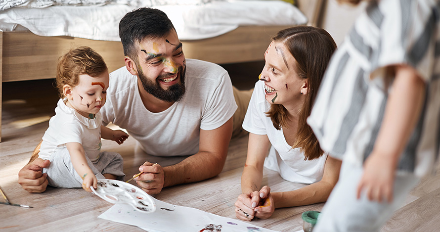 Young family enjoys time together at home. 