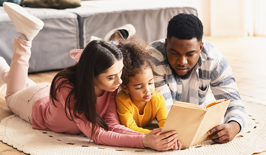 A multiracial family enjoys time together during quarantine. 