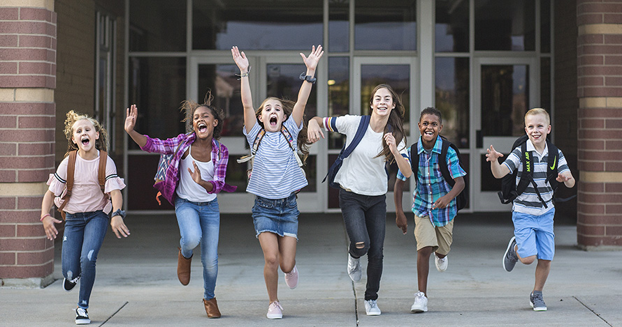 Kids running out of school.