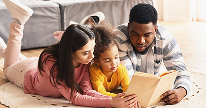 A multiracial family enjoys time together during quarantine. 