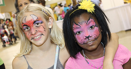 Girls with faces painted.